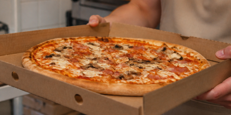 Función de los agujeros en las cajas de pizza